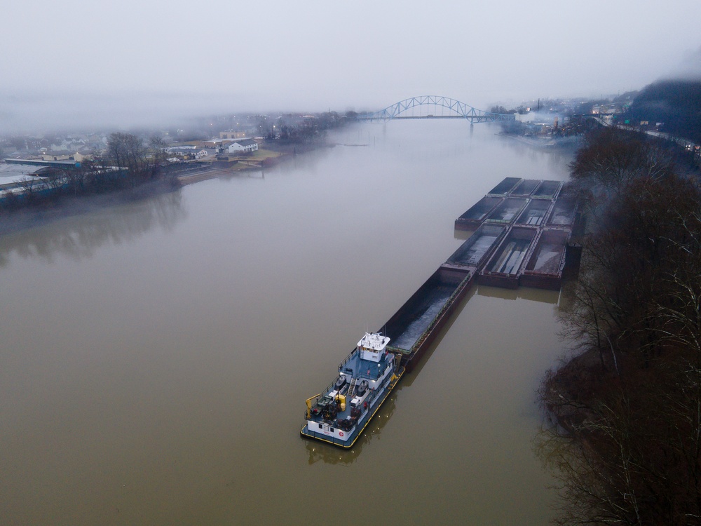 Towboats navigate through Pittsburgh District’s foggy landscape