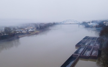 Towboats navigate through Pittsburgh District’s foggy landscape