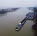 Towboats navigate through Pittsburgh District’s foggy landscape