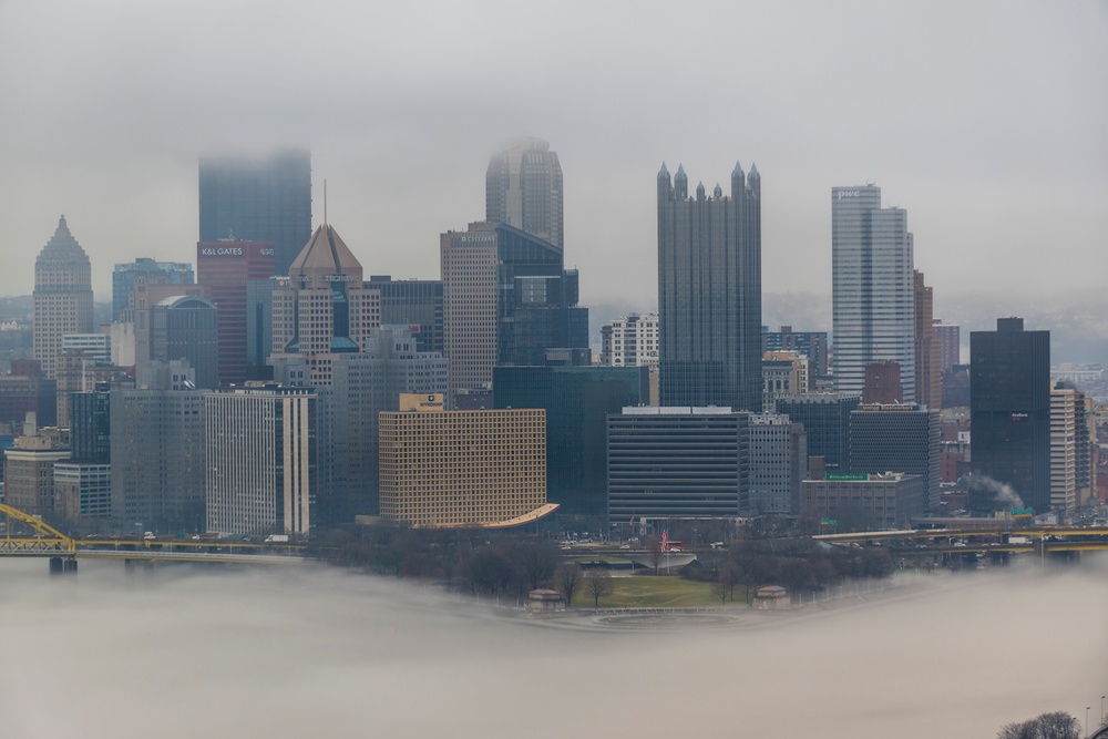 Towboats navigate through Pittsburgh District’s foggy landscape