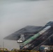 Towboats navigate through Pittsburgh District’s foggy landscape