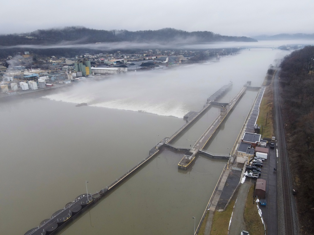 Towboats navigate through Pittsburgh District’s foggy landscape