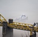 Towboats navigate through Pittsburgh District’s foggy landscape