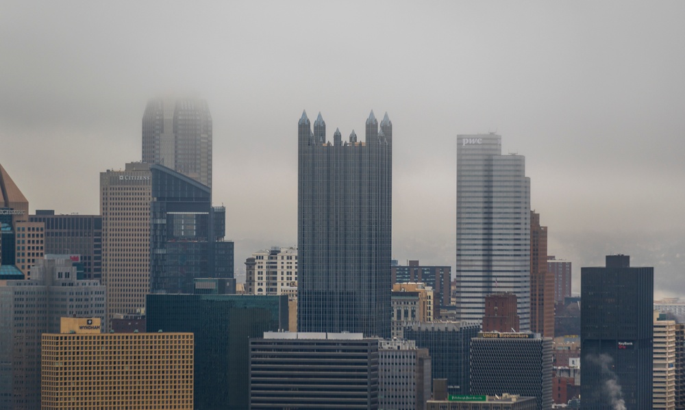 Towboats navigate through Pittsburgh District’s foggy landscape