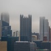 Towboats navigate through Pittsburgh District’s foggy landscape