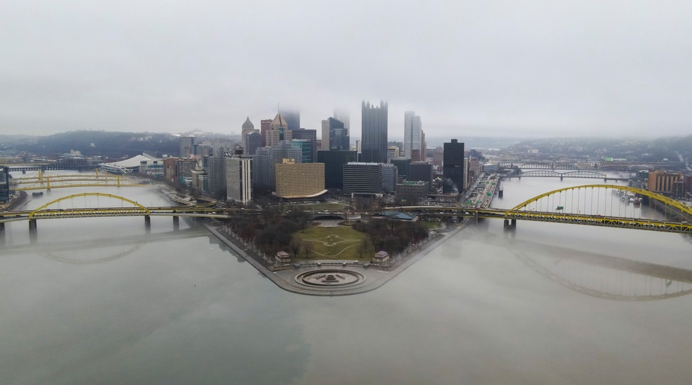 Towboats navigate through Pittsburgh District’s foggy landscape