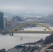 Towboats navigate through Pittsburgh District’s foggy landscape