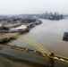 Towboats navigate through Pittsburgh District’s foggy landscape