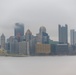 Towboats navigate through Pittsburgh District’s foggy landscape