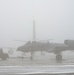 Crews Move Aircraft Across Foggy Airfield at Selfridge Air National Guard Base