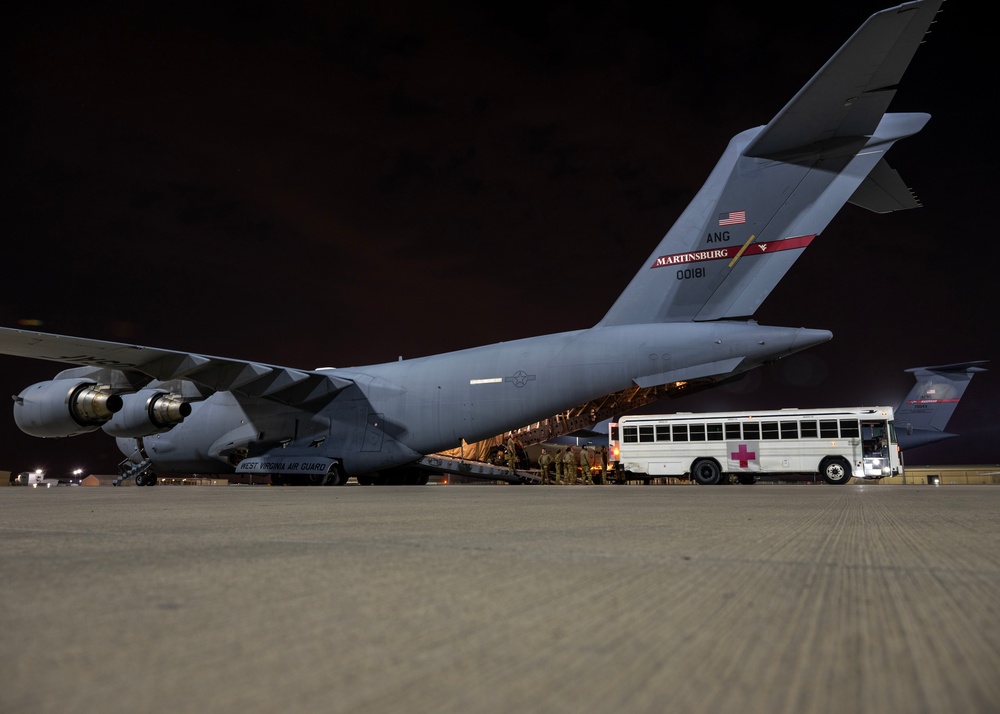 Airmen perform an aeromedical evacuation