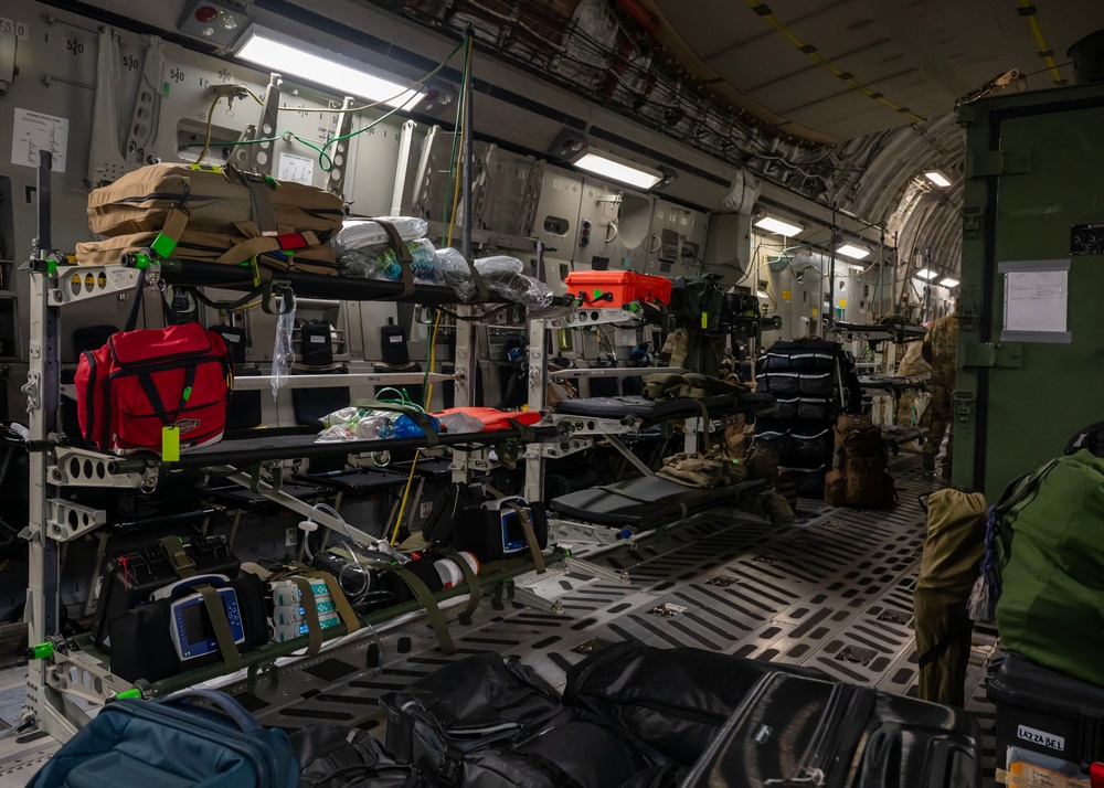 Airmen perform an aeromedical evacuation