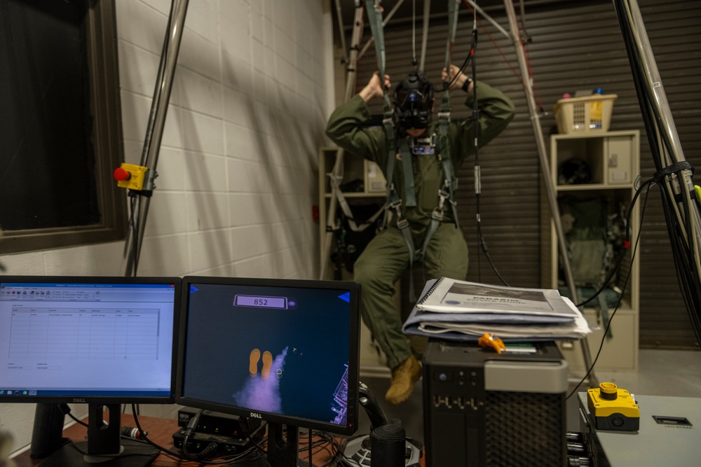 Pilots participate in emergency parachute training