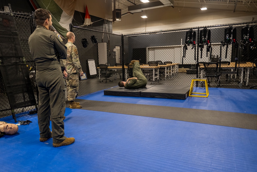 Pilots participate in emergency parachute training