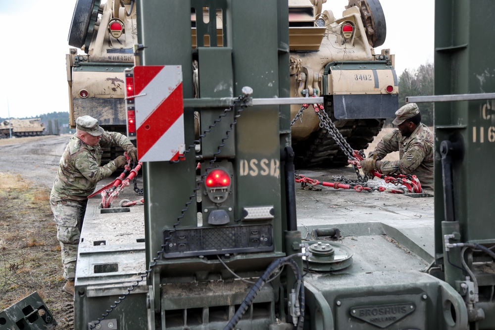 Logisticians move M88 armor vehicles in Poland