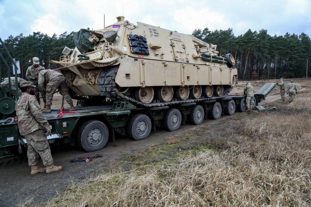 Logisticians move M88 armor vehicles in Poland