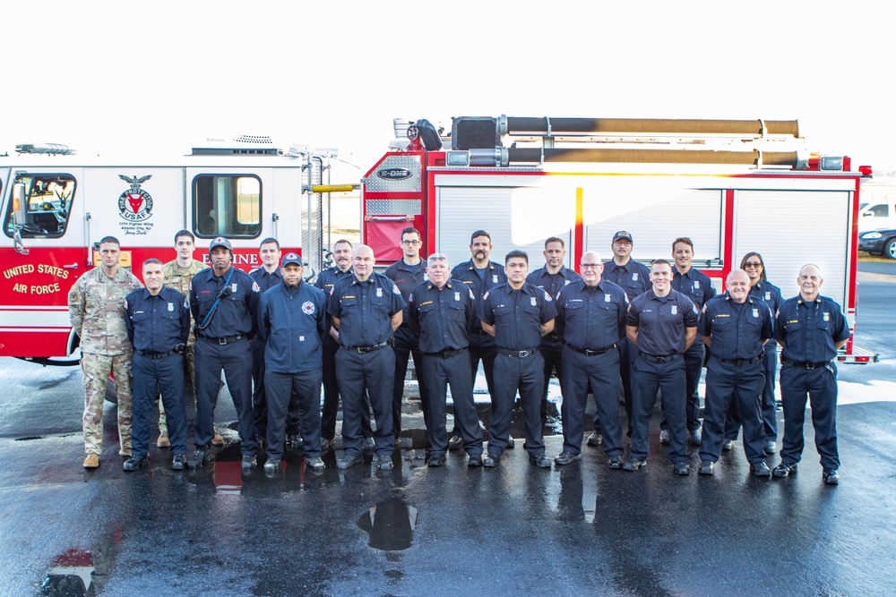 Members of the 177th Fire Department, 177th Fighter Wing, New Jersey Air National Guard, pose for a group photograph at the 177FW