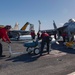 Sailors load ordnance