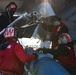 Sailors load ordnance