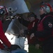 Sailors load ordnance
