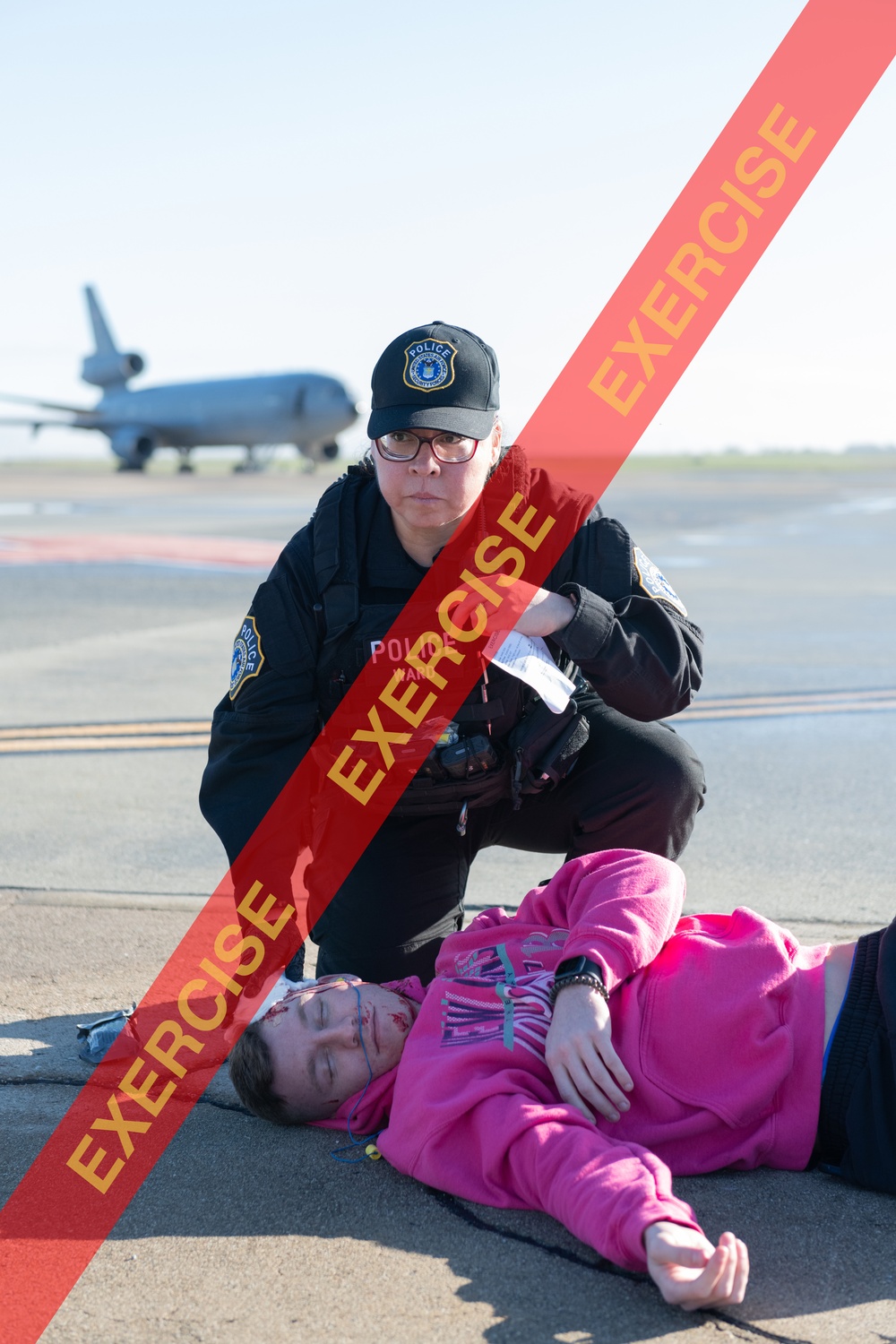 First aid applied to simulated wounded during exercise.