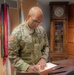 Gen. Gary Brito signs the guest book at the headquarters of U.S. Army Europe and Africa