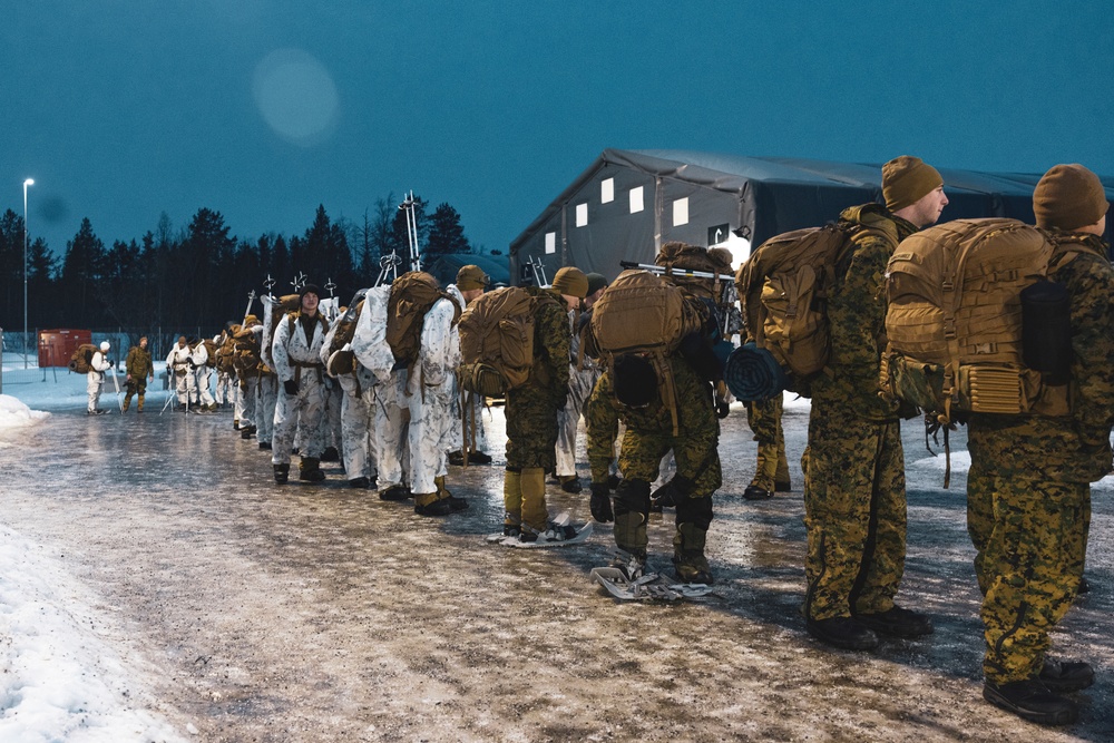 U.S. Marines and Sailors execute an ice-breaker drill before Exercise Nordic Response 24