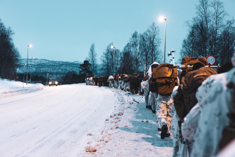 U.S. Marines and Sailors execute an ice-breaker drill before Exercise Nordic Response 24