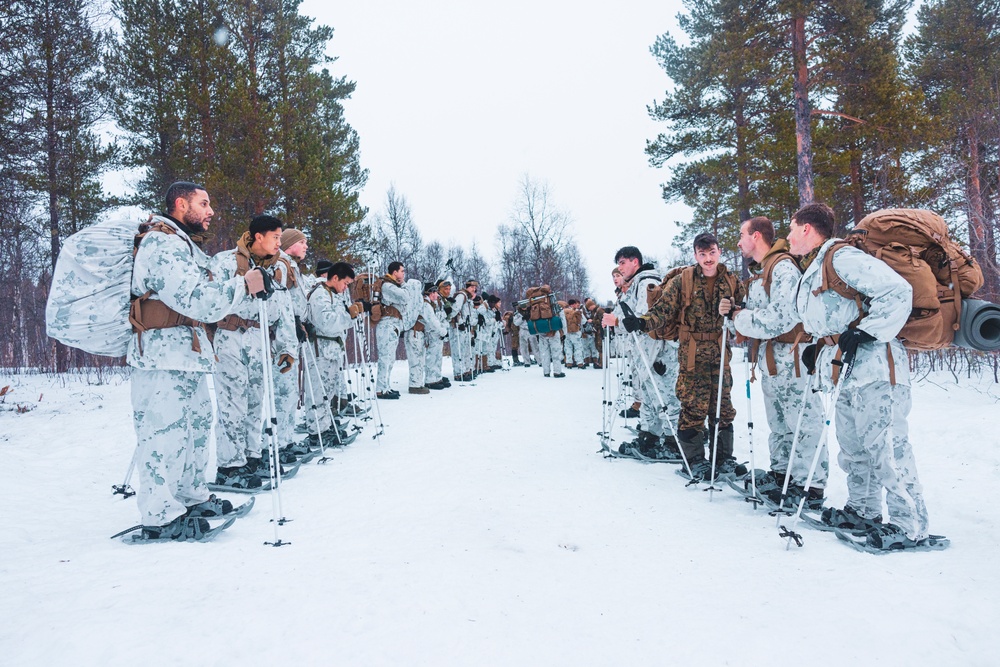 U.S. Marines and Sailors execute an ice-breaker drill before Exercise Nordic Response 24