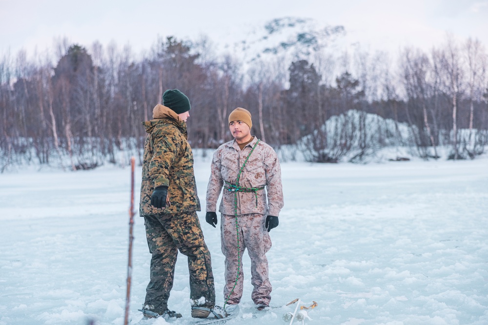 U.S. Marines and Sailors execute an ice-breaker drill before Exercise Nordic Response 24