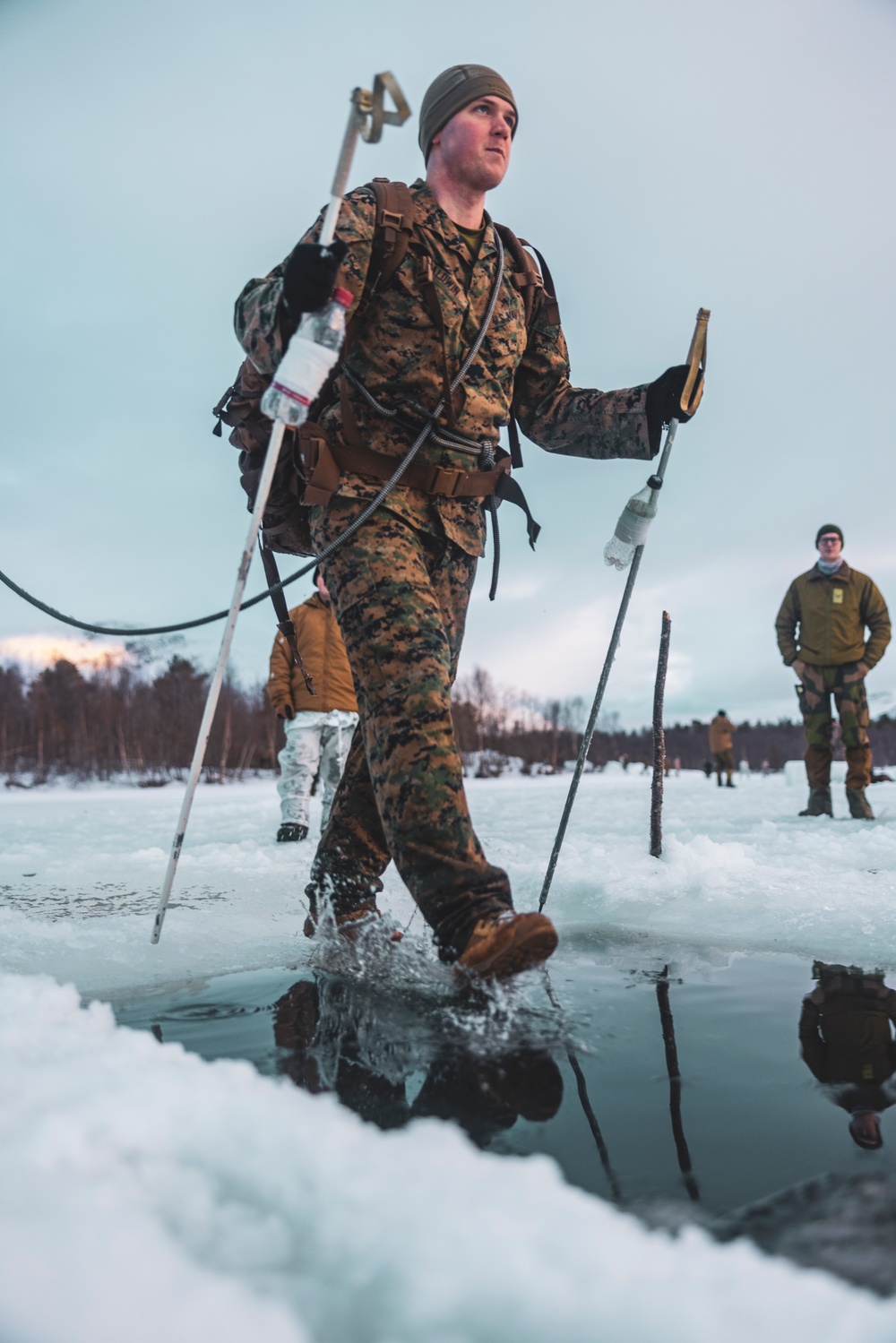 U.S. Marines and Sailors execute an ice-breaker drill before Exercise Nordic Response 24