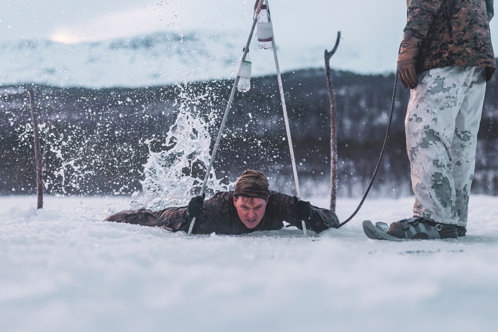 U.S. Marines and Sailors execute an ice-breaker drill before Exercise Nordic Response 24