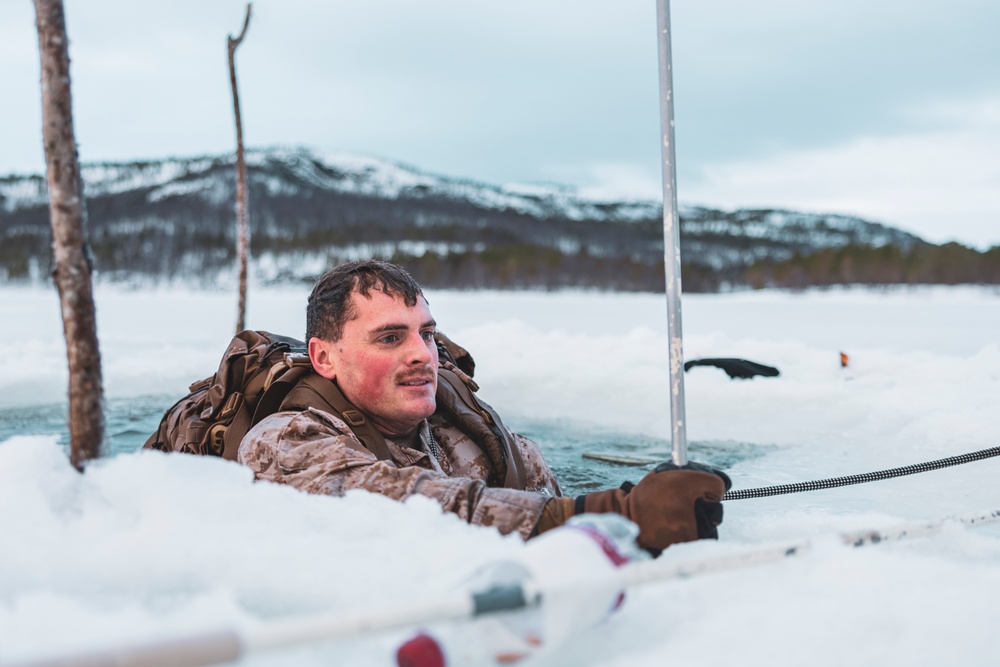 U.S. Marines and Sailors execute an ice-breaker drill before Exercise Nordic Response 24