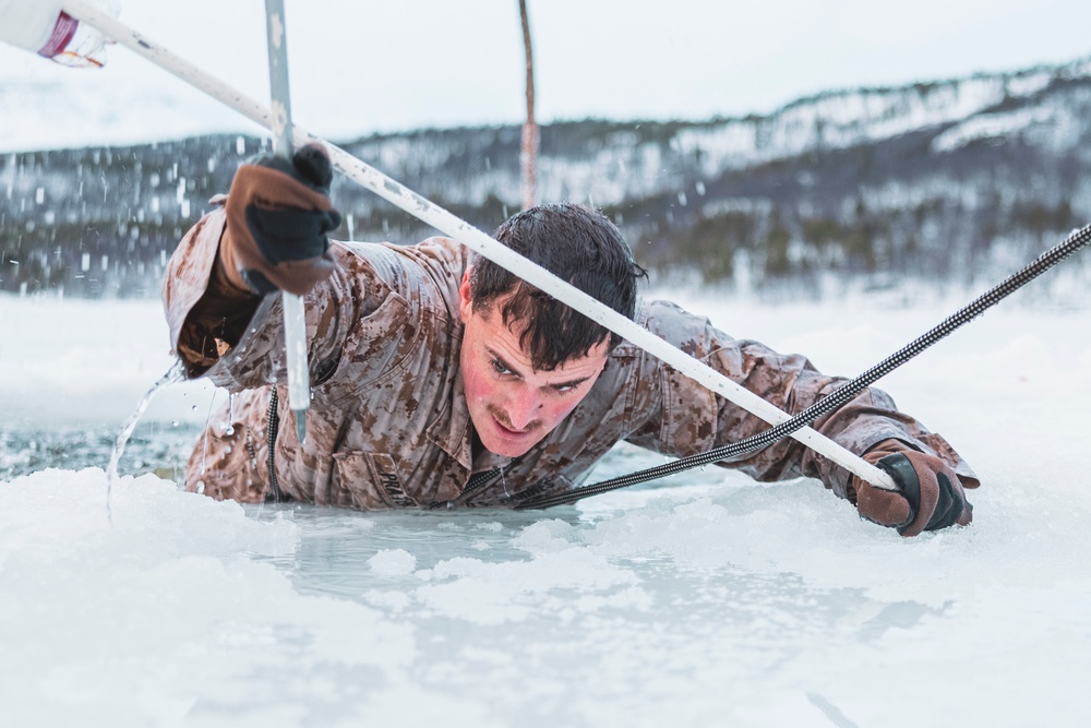 U.S. Marines and Sailors execute an ice-breaker drill before Exercise Nordic Response 24