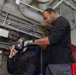 USS Ronald Reagan (CVN 76) conducts Chemical, Biological and Radiological mask and suit fitting