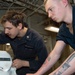 USS Ronald Reagan (CVN 76) Sailors renovate a bathroom