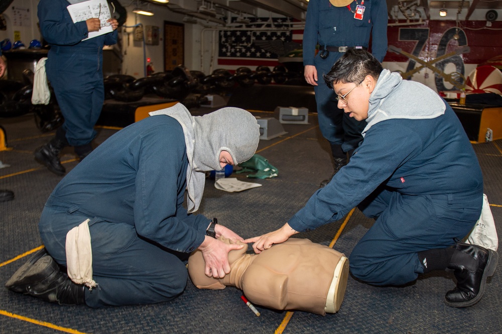 USS Ronald Reagan (CVN 76) Sailors train during general quarters drill