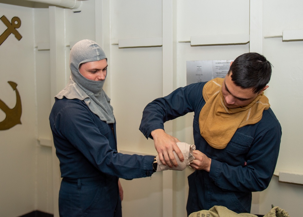 USS Ronald Reagan (CVN 76) Sailors train during general quarters drill