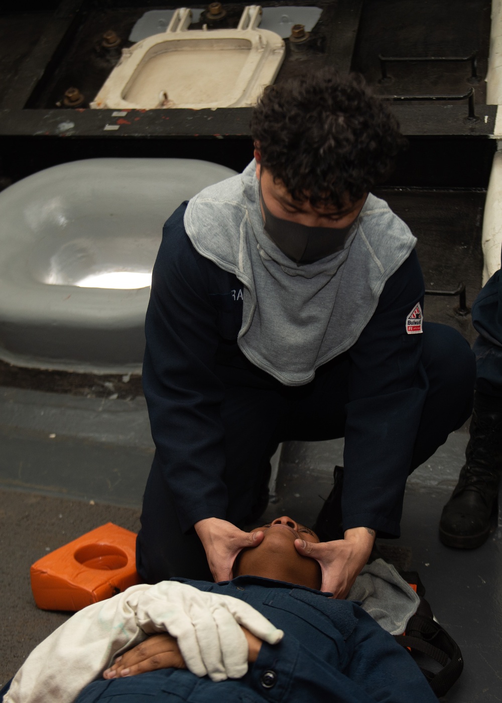 USS Ronald Reagan (CVN 76) Sailors train during general quarters drill