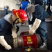 USS Ronald Reagan (CVN 76) Sailors train during general quarters drill