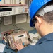 USS Ronald Reagan (CVN 76) Sailors calibrate a direct current ammeter