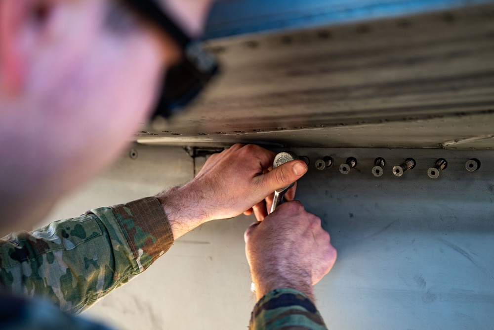 The F-16 Viper Demonstration Team perform jet maintenance during the off season