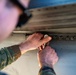 The F-16 Viper Demonstration Team perform jet maintenance during the off season