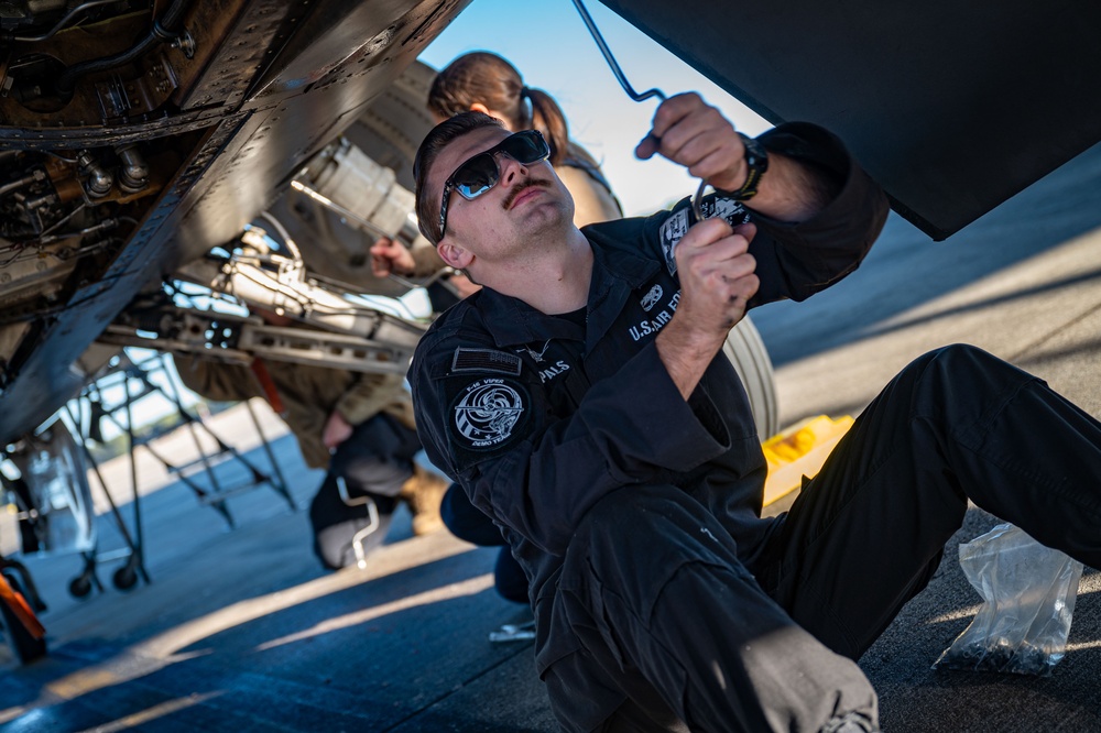 The F-16 Viper Demonstration Team perform jet maintenance during the off season