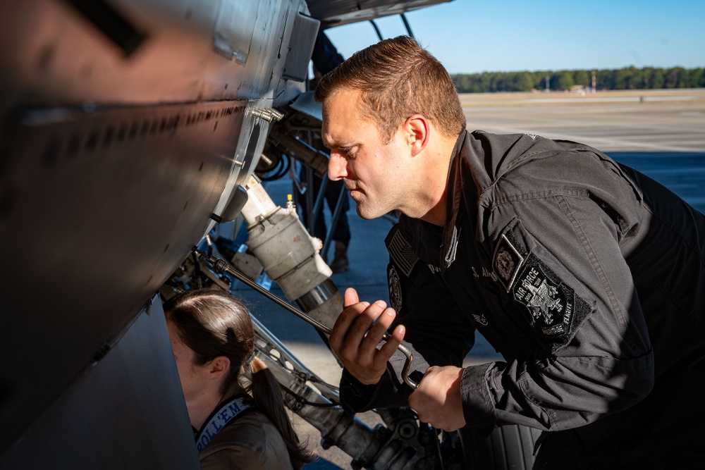 The F-16 Viper Demonstration Team perform jet maintenance during the off season