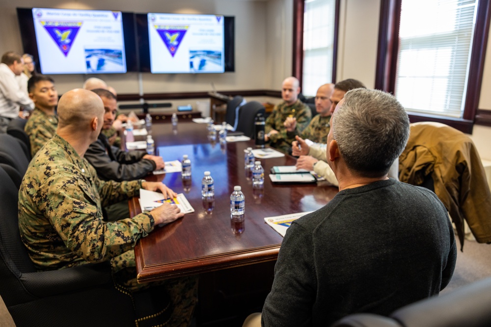 DOD representative visits Quantico, awards three Marines