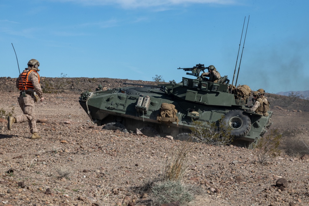 Marines with 3rd Light Armored Reconnaissance Battalion conduct a platoon attack while participating in SLTE 2-24