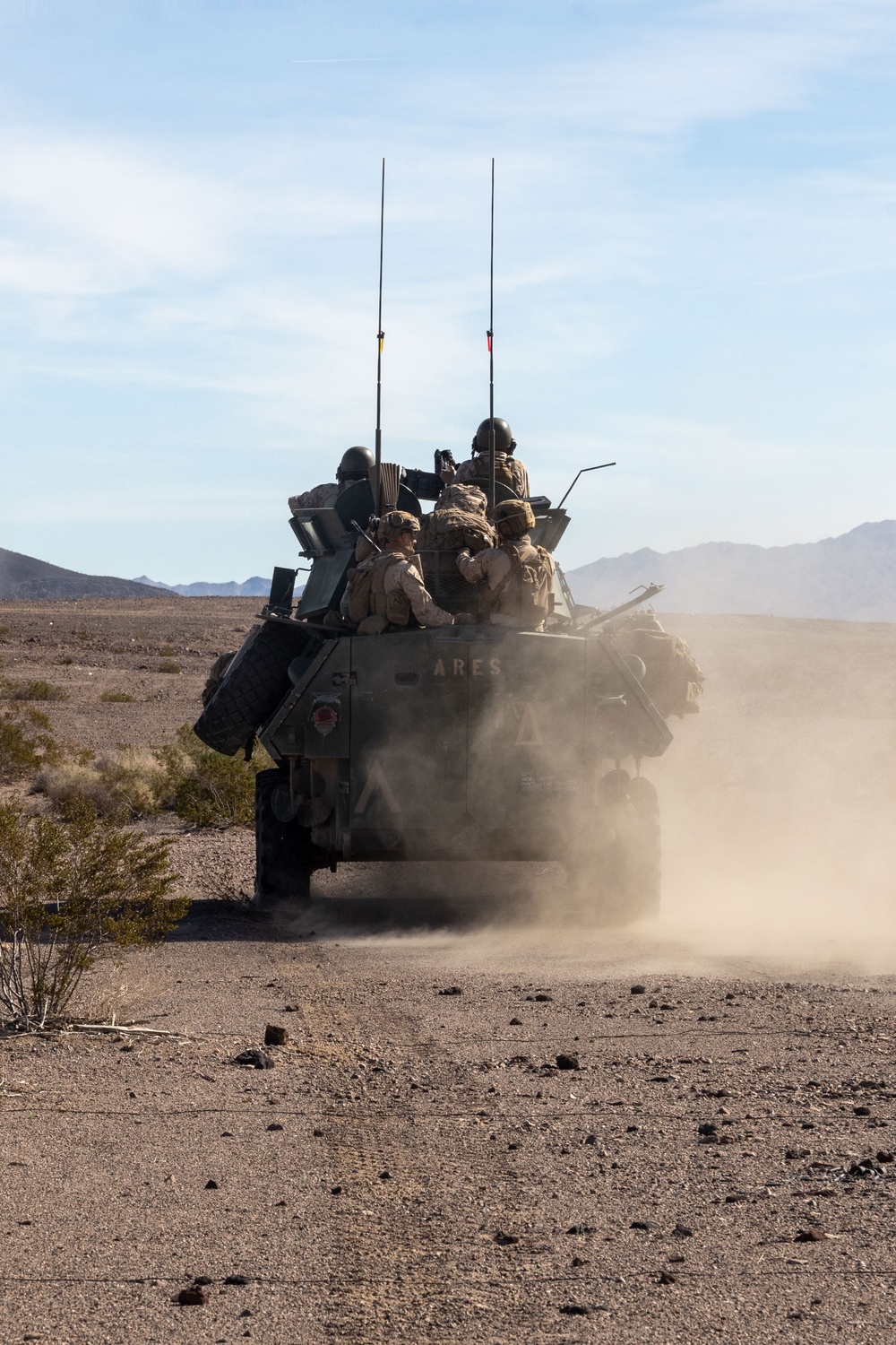 Marines with 3rd Light Armored Reconnaissance Battalion conduct a platoon attack while participating in SLTE 2-24