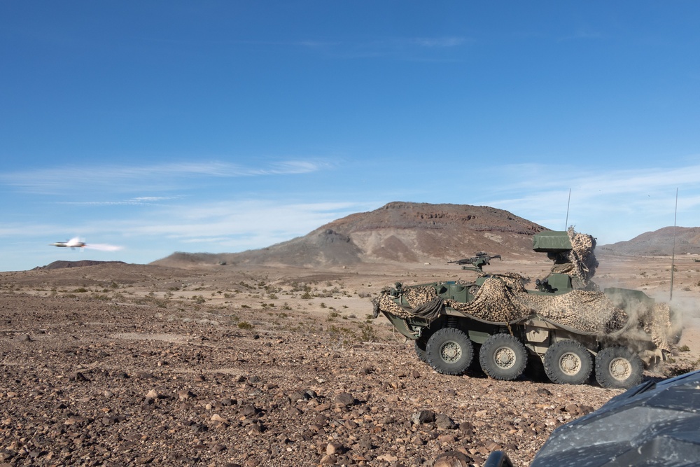 Marines with 3rd Light Armored Reconnaissance Battalion conduct a platoon attack while participating in SLTE 2-24