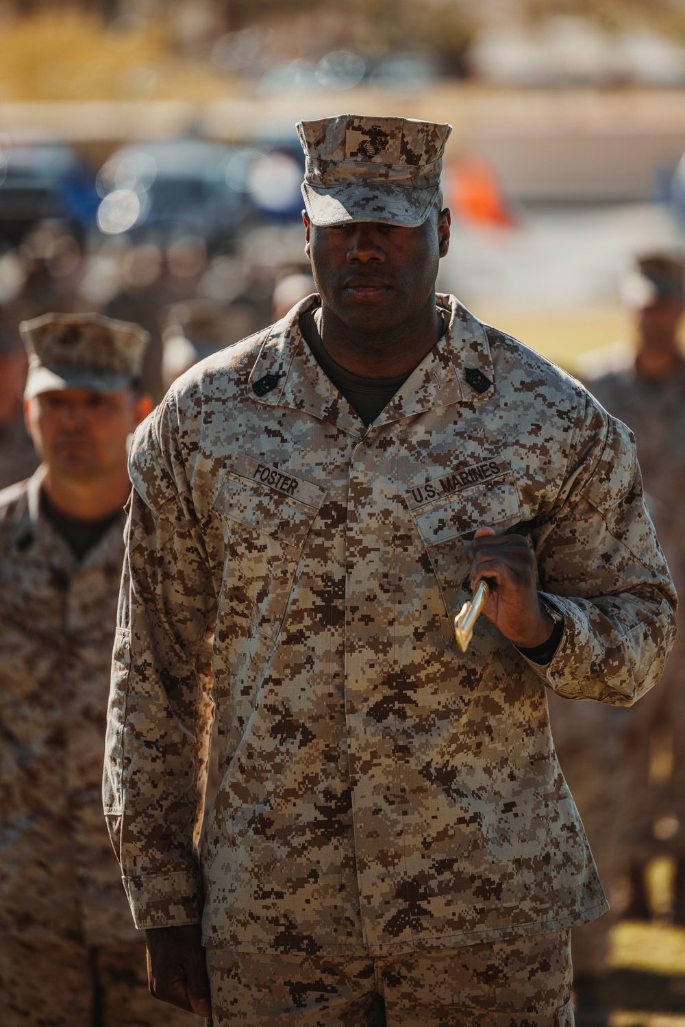 CLB 7 Sgt. Maj. James Foster is relieved by Sgt. Maj. Michael Allen during a relief and appointment ceremony